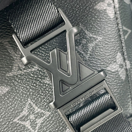 MESSENGER VOYAGER PM 33 IN GUN METAL MONOGRAM ECLIPSE CANVAS