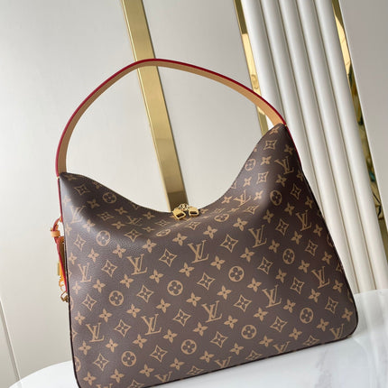 SLOUCHY MM 40 IN BROWN MONOGRAM CANVAS