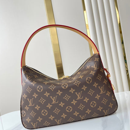 SLOUCHY PM 33 IN BROWN MONOGRAM CANVAS