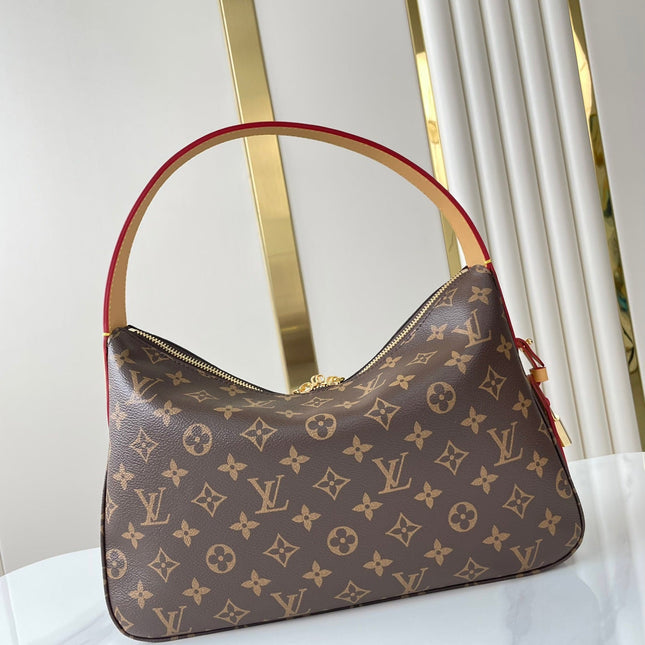 SLOUCHY PM 33 IN BROWN MONOGRAM CANVAS