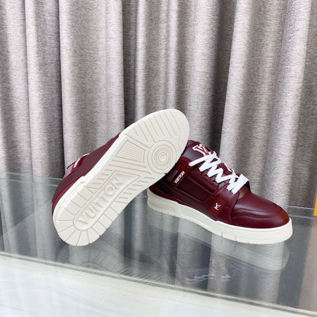 LV MAXI TRAINER IN GARNET RED CALFSKIN