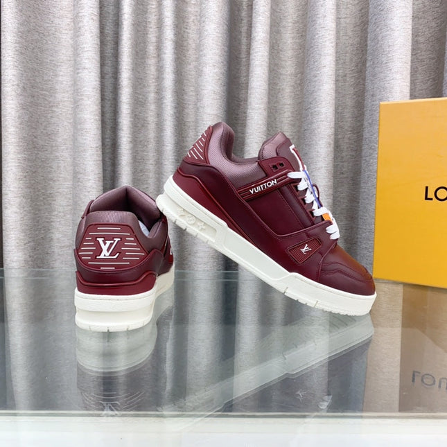 LV MAXI TRAINER IN GARNET RED CALFSKIN