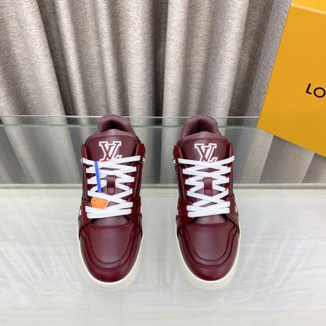 LV MAXI TRAINER IN GARNET RED CALFSKIN