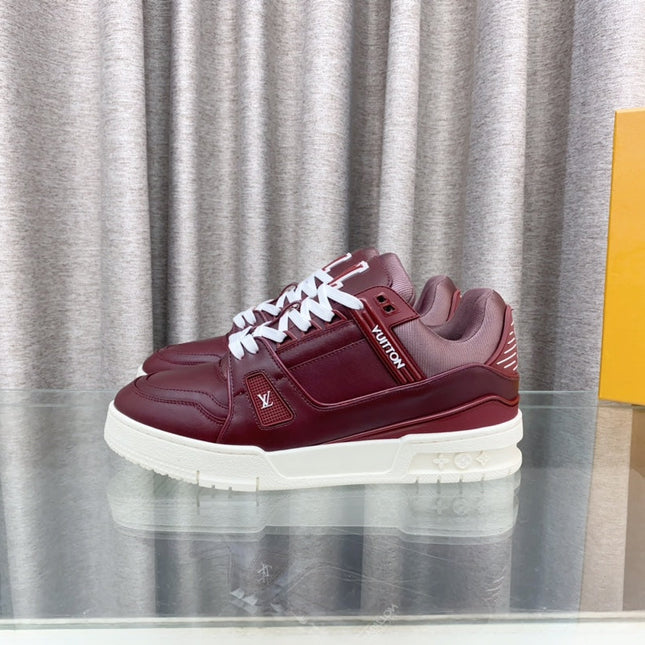LV MAXI TRAINER IN GARNET RED CALFSKIN