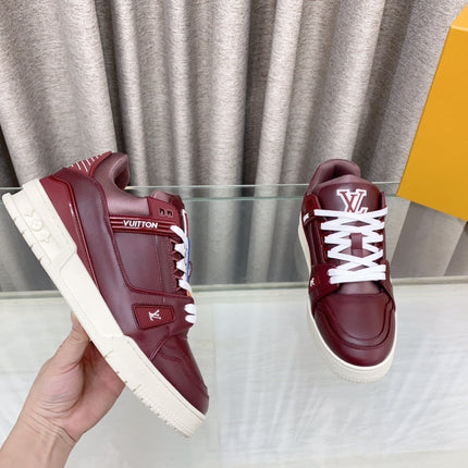 LV MAXI TRAINER IN GARNET RED CALFSKIN