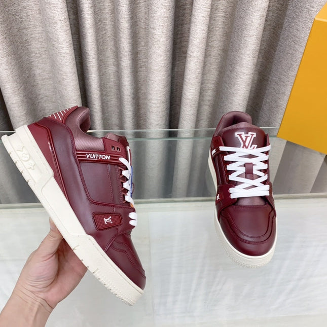 LV MAXI TRAINER IN GARNET RED CALFSKIN