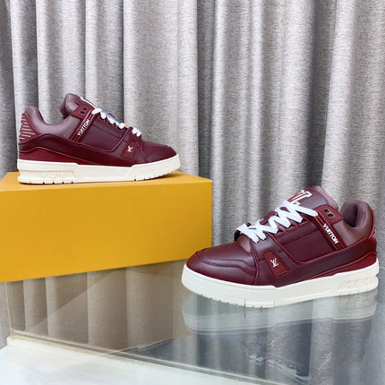 LV MAXI TRAINER IN GARNET RED CALFSKIN