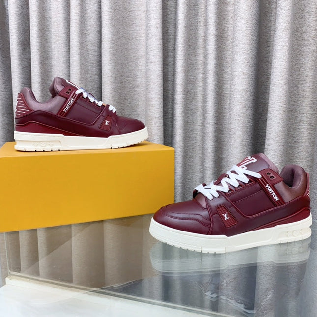 LV MAXI TRAINER IN GARNET RED CALFSKIN