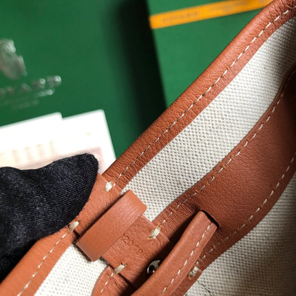 PETIT FLOT BUCKET BAG 22 IN BLACK GOYARDINE CANVAS AND TAN LAMBSKIN TRIM