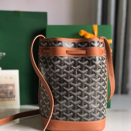 PETIT FLOT BUCKET BAG 22 IN BLACK GOYARDINE CANVAS AND TAN LAMBSKIN TRIM
