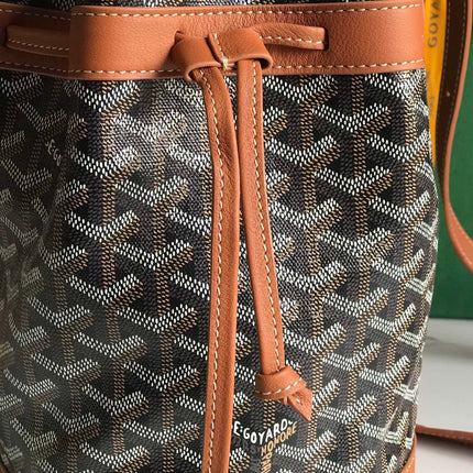 PETIT FLOT BUCKET BAG 22 IN BLACK GOYARDINE CANVAS AND TAN LAMBSKIN TRIM