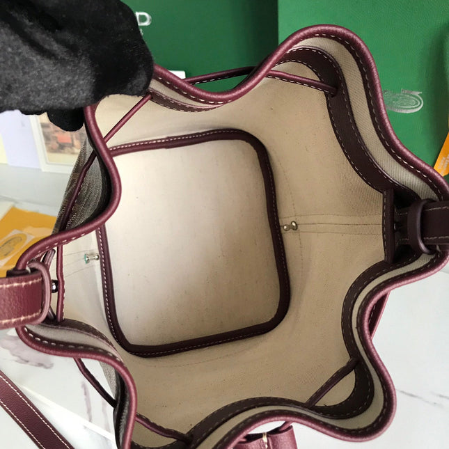PETIT FLOT BUCKET BAG 22 IN WINE RED GOYARDINE CANVAS AND LAMBSKIN TRIM