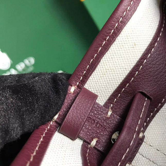 PETIT FLOT BUCKET BAG 22 IN WINE RED GOYARDINE CANVAS AND LAMBSKIN TRIM