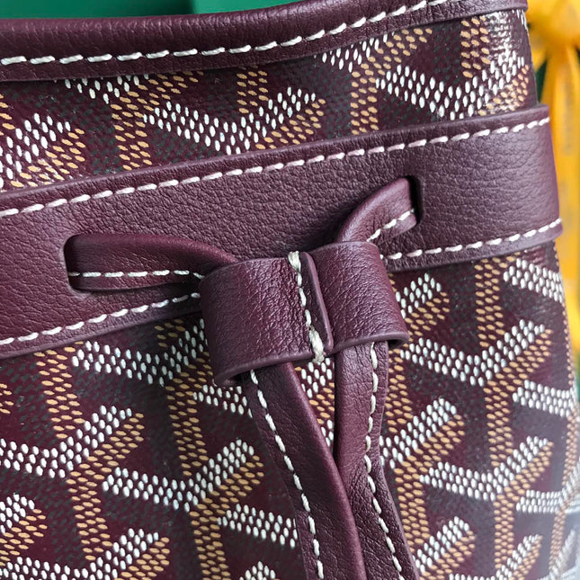 PETIT FLOT BUCKET BAG 22 IN WINE RED GOYARDINE CANVAS AND LAMBSKIN TRIM