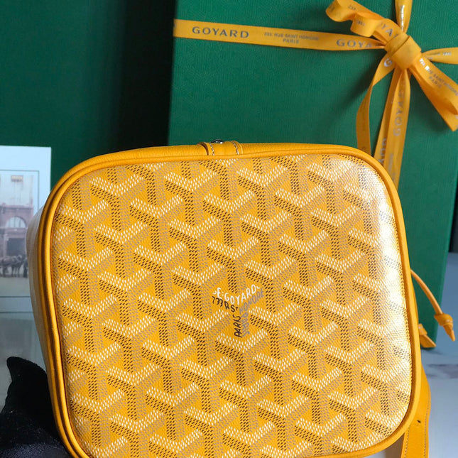 PETIT FLOT BUCKET BAG 22 IN YELLOW GOYARDINE CANVAS AND LAMBSKIN TRIM