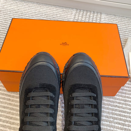 BOUNCING SNEAKER IN BLACK GRAPHIC MESH AND CALFSKIN