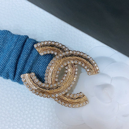 DOUBLE C ELASTIC BELT 30MM IN BLUE DENIM WITH GOLD BUCKLE AND SIDE RHINESTONE DETAILING