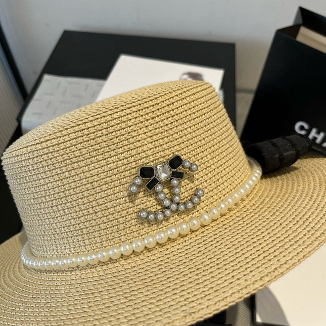 FLAT STRAW HAT WITH BOW BLACK 673921