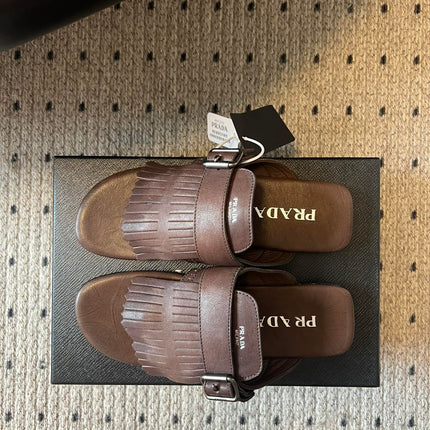 PRADA 25S SHUFFLE LEATHER THONG SANDALS IN BROWN CALFSKIN