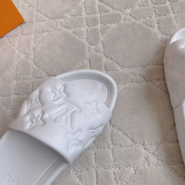 LV EMBOSSED POOL PILLOW SANDALS IN WHITE RUBBER