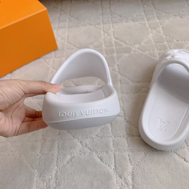 LV EMBOSSED POOL PILLOW SANDALS IN WHITE RUBBER