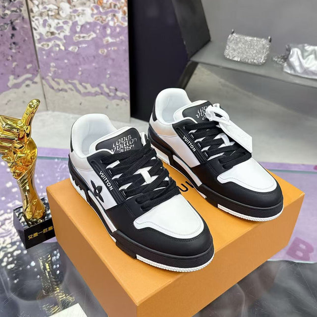 LV TRAINER SNEAKERS IN BLACK AND WHITE CALFSKIN