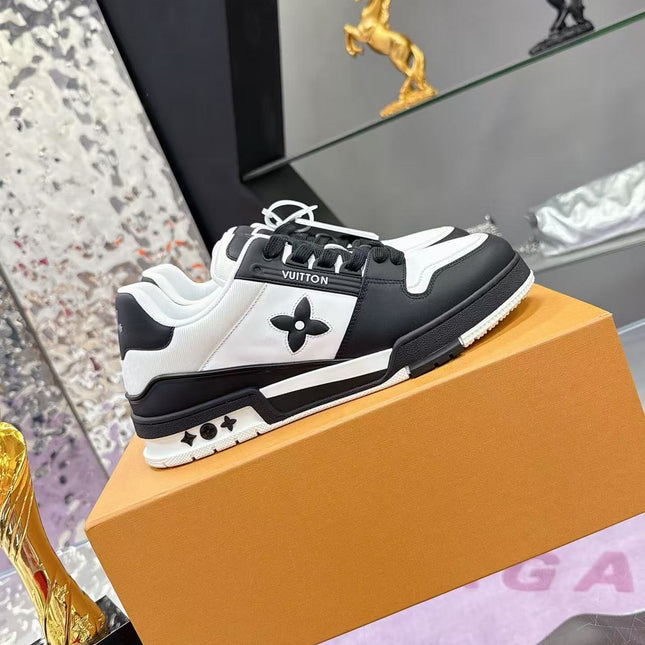 LV TRAINER SNEAKERS IN BLACK AND WHITE CALFSKIN