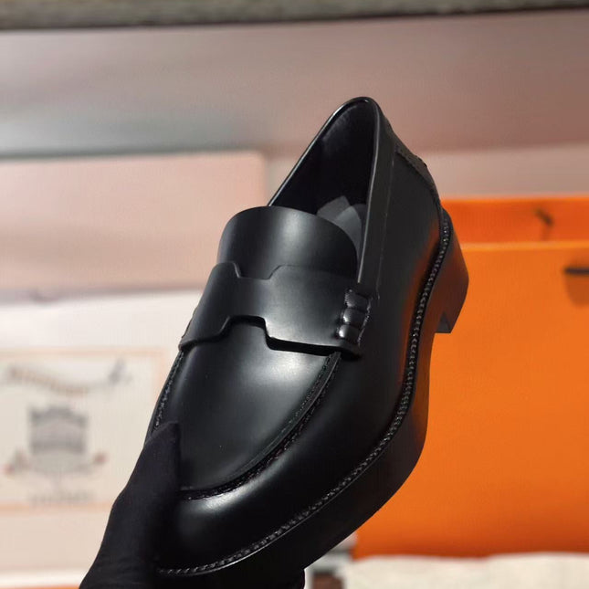 HM PARIS LOAFERS IN BLACK CALFSKIN WITH CLASSIC PENNY STRAP DESIGN