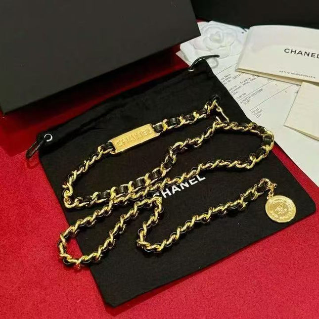 CC INTERWOVEN CHAIN BELT IN GOLD MIX BLACK METAL AND CALFSKIN WITH COIN CHARM