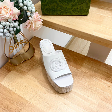 HIGH 10CM WEDGE SANDALS IN WHITE SHEEPSKIN