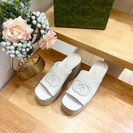 HIGH 10CM WEDGE SANDALS IN WHITE SHEEPSKIN