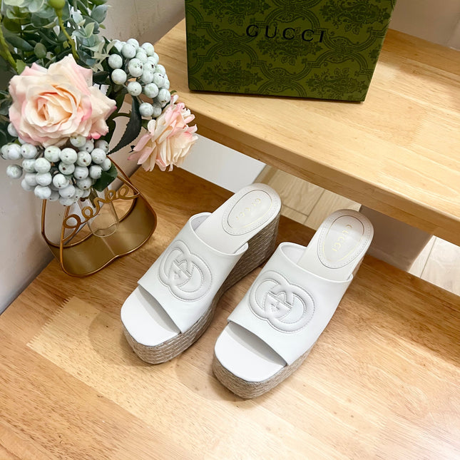 HIGH 10CM WEDGE SANDALS IN WHITE SHEEPSKIN