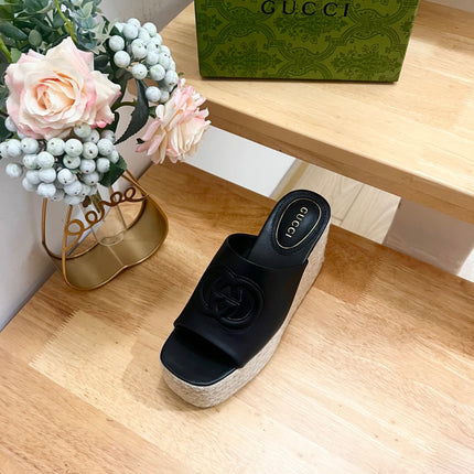HIGH 10CM WEDGE SANDALS IN BLACK SHEEPSKIN