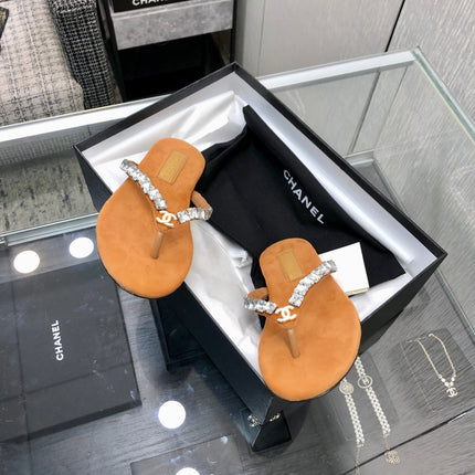 THONG SLIDE IN BRONZE BROWN SUEDE WITH WHITE CRYSTALS