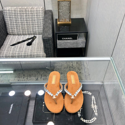 THONG SLIDE IN BRONZE BROWN SUEDE WITH WHITE CRYSTALS