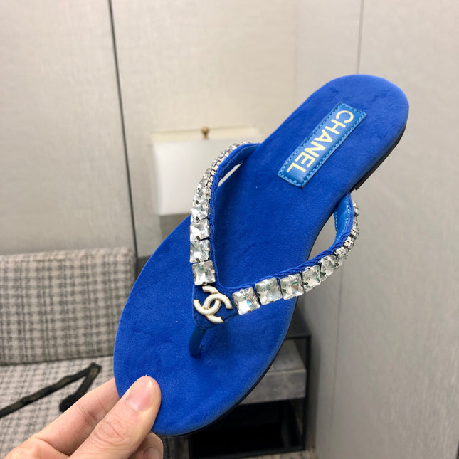 THONG SLIDE IN COBALT BLUE SUEDE WITH WHITE CRYSTALS