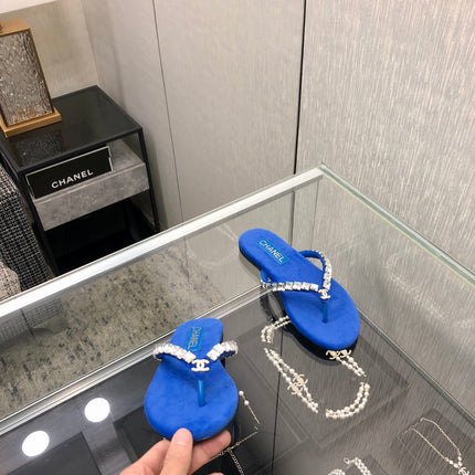 THONG SLIDE IN COBALT BLUE SUEDE WITH WHITE CRYSTALS