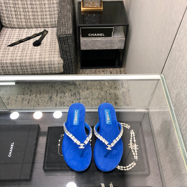 THONG SLIDE IN COBALT BLUE SUEDE WITH WHITE CRYSTALS