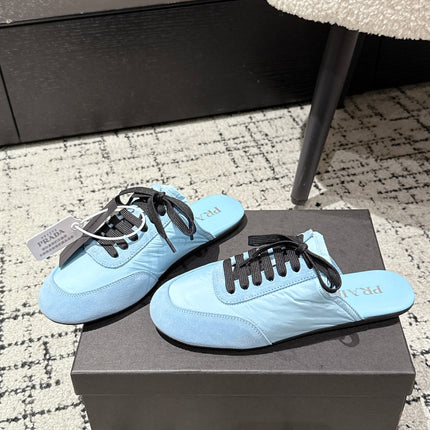 PRADA 25S DEXUN MULE IN LIGHT BLUE SUEDE LEATHER