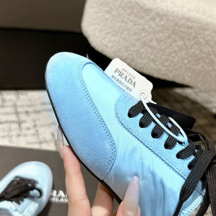 PRADA 25S DEXUN MULE IN LIGHT BLUE SUEDE LEATHER
