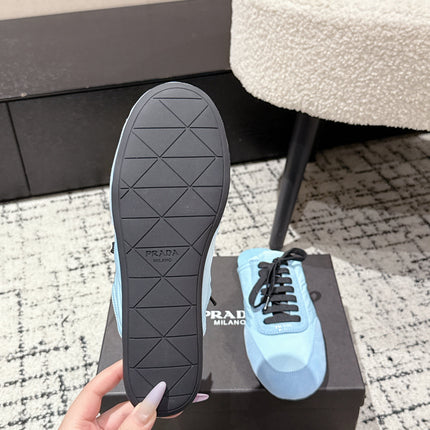 PRADA 25S DEXUN MULE IN LIGHT BLUE SUEDE LEATHER
