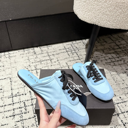 PRADA 25S DEXUN MULE IN LIGHT BLUE SUEDE LEATHER