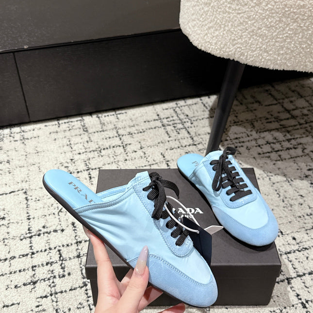 PRADA 25S DEXUN MULE IN LIGHT BLUE SUEDE LEATHER