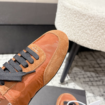 PRADA 25S DEXUN MULE IN BURNT ORANGE SUEDE LEATHER