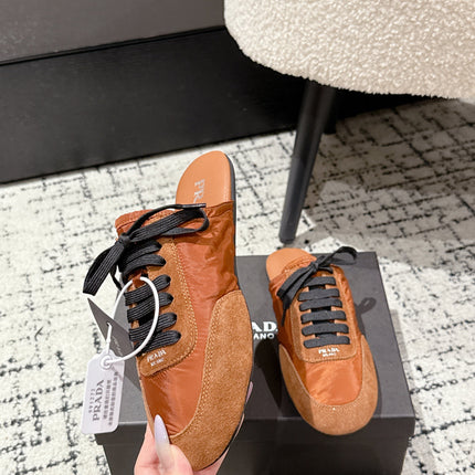 PRADA 25S DEXUN MULE IN BURNT ORANGE SUEDE LEATHER
