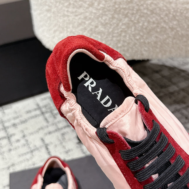 PRADA 25S COLLAPSE SNEAKERS IN RED RE NYLON AND SUEDE