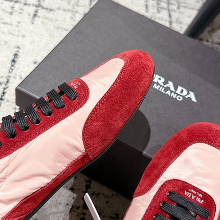 PRADA 25S COLLAPSE SNEAKERS IN RED RE NYLON AND SUEDE