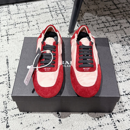 PRADA 25S COLLAPSE SNEAKERS IN RED RE NYLON AND SUEDE