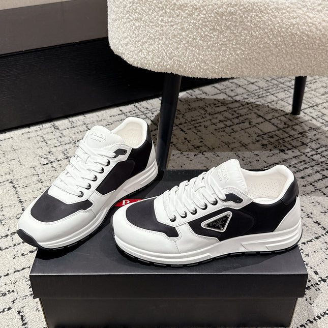 PRADA 25S MEN SNEAKERS LOGO IN WHITE AND BLACK NUBUCK AND CANVAS