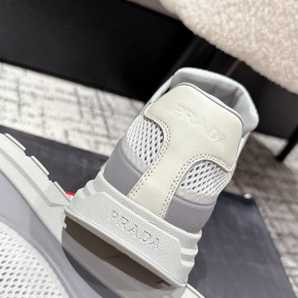 PRADA 25S MEN SNEAKERS IN GRAY AND WHITE CANVAS